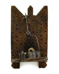 Iron and brass Betty lamp with wooden candlestick shelf pennsylvania and new england, 18th/19th century