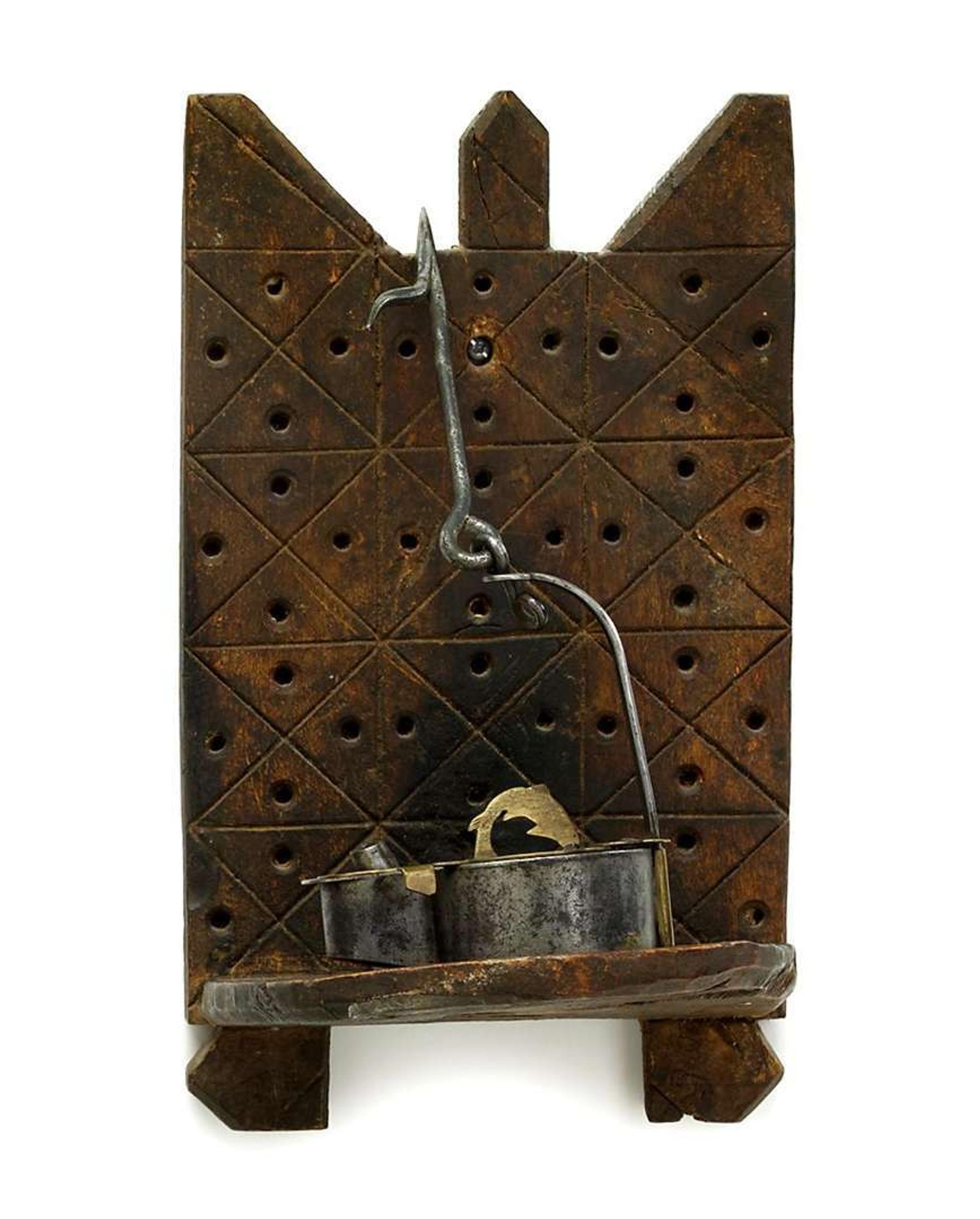Iron and brass Betty lamp with wooden candlestick shelf pennsylvania and new england, 18th/19th century