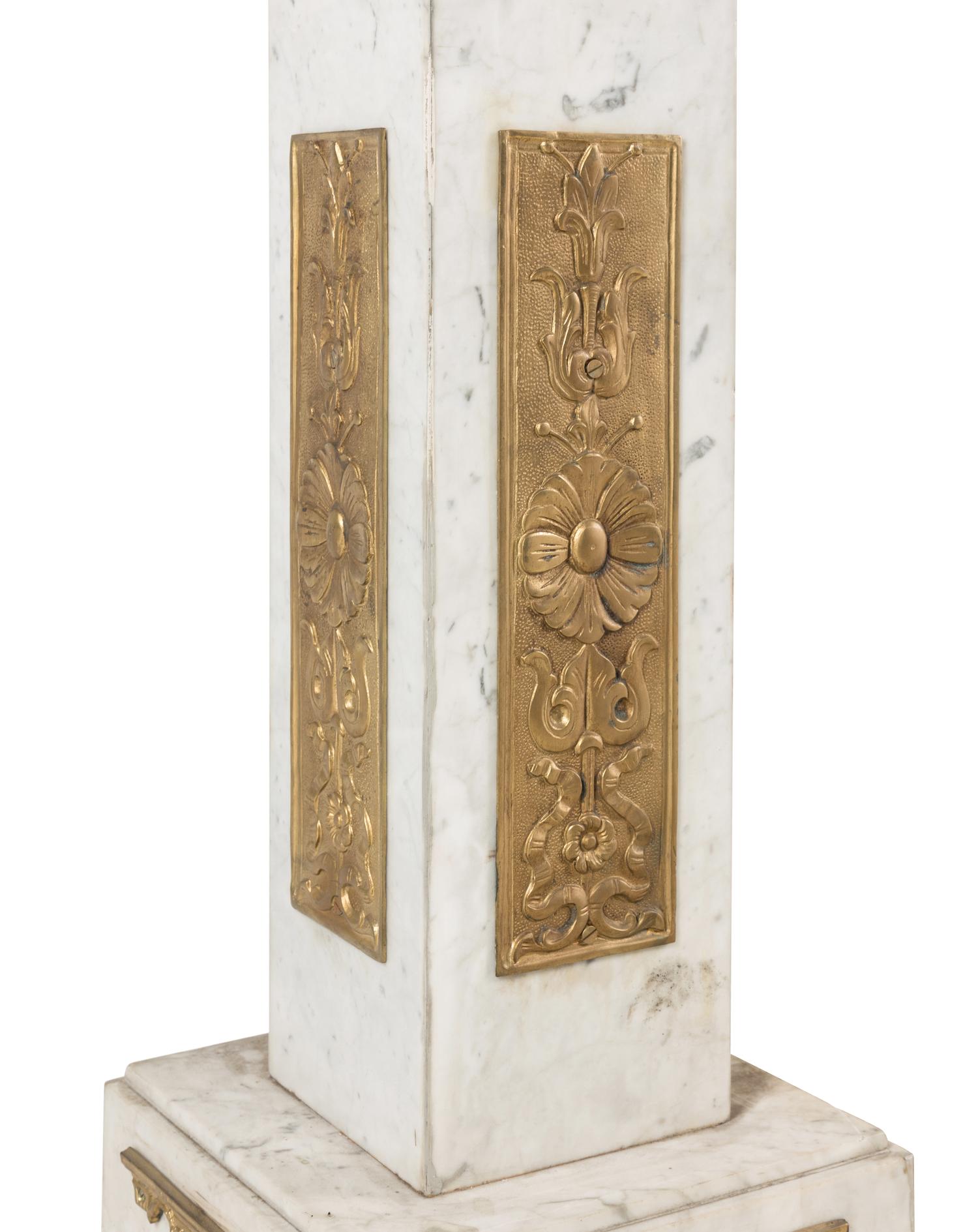 A Pair of Marble and Gilt Bronze Mounted Pedestals