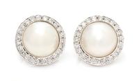 A Pair of White Gold, Cultured Mabe Pearl and Diamond Earclips, 10.30 dwts.