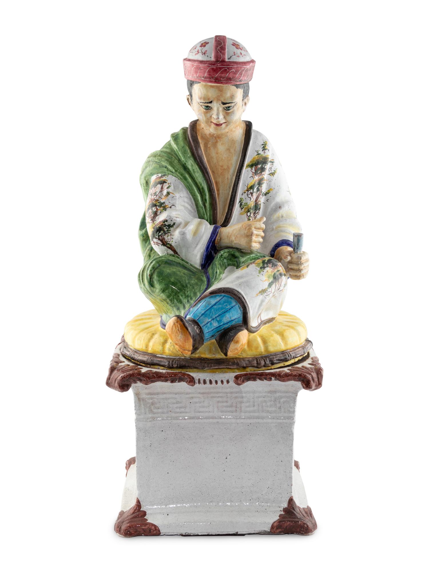 An Italian Polychrome-Glazed Terra Cotta Chinoiserie Figure