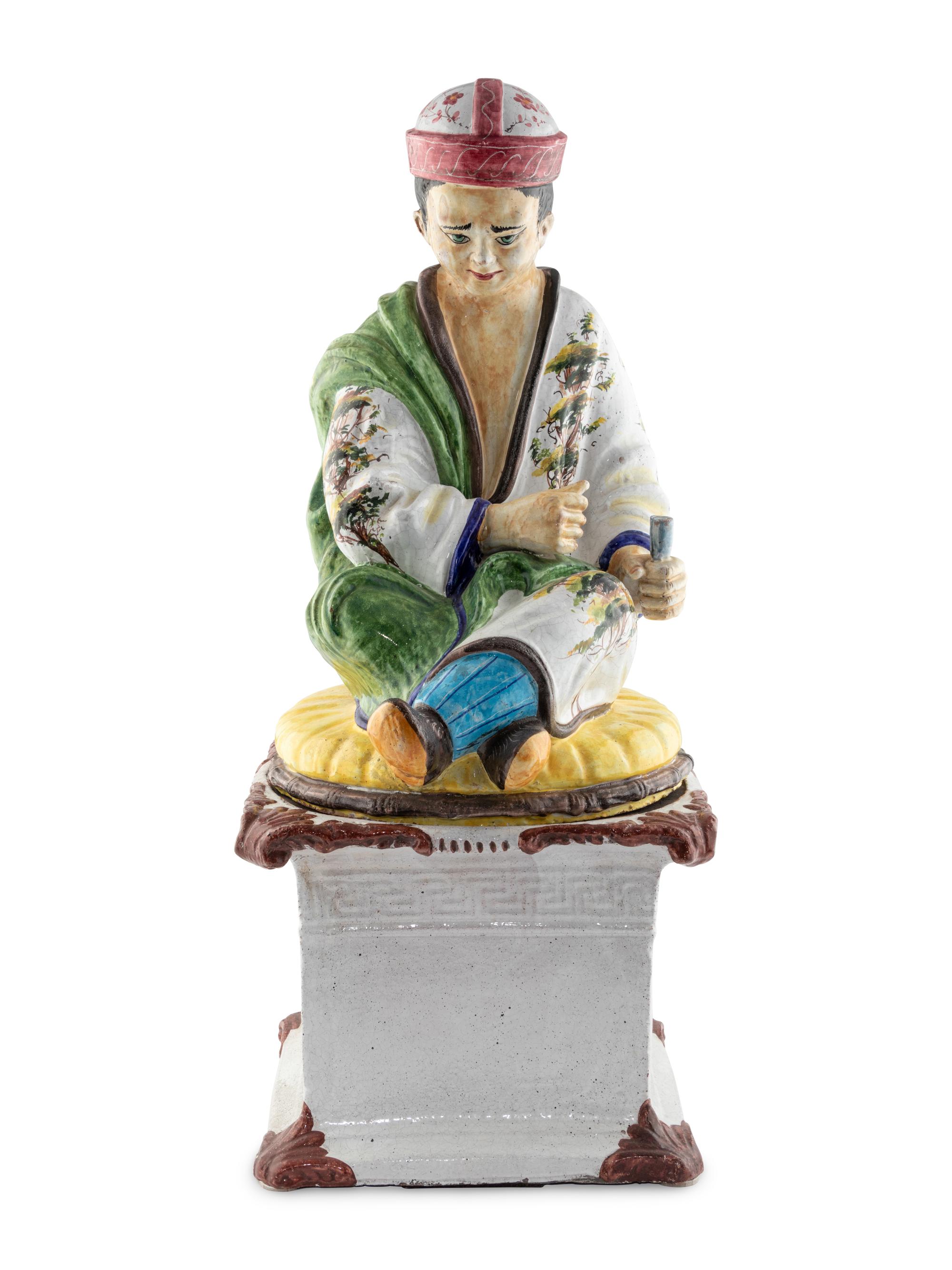 An Italian Polychrome-Glazed Terra Cotta Chinoiserie Figure
