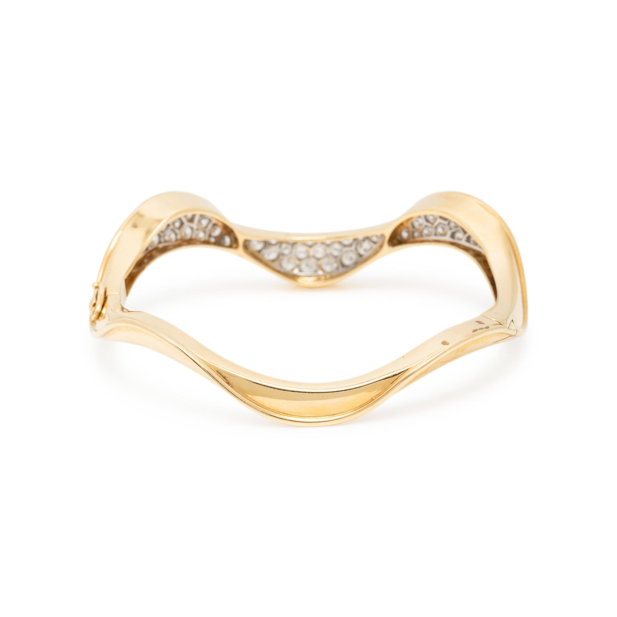 OSCAR HEYMAN, YELLOW GOLD AND DIAMOND BANGLE BRACELET