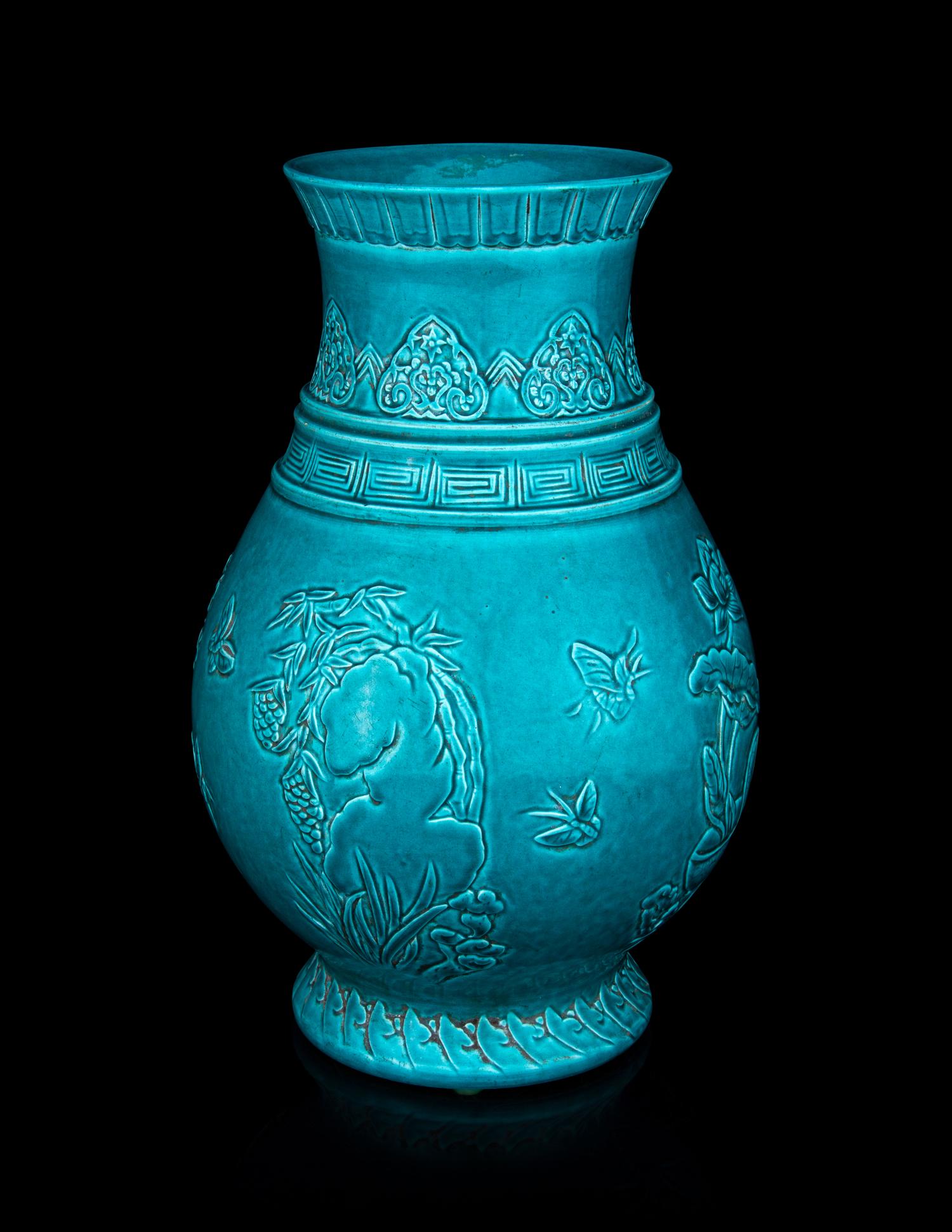A Carved Turquoise-Glazed Porcelain Hu Vase