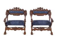 A Pair of Italian Renaissance Style Carved Walnut Armchairs