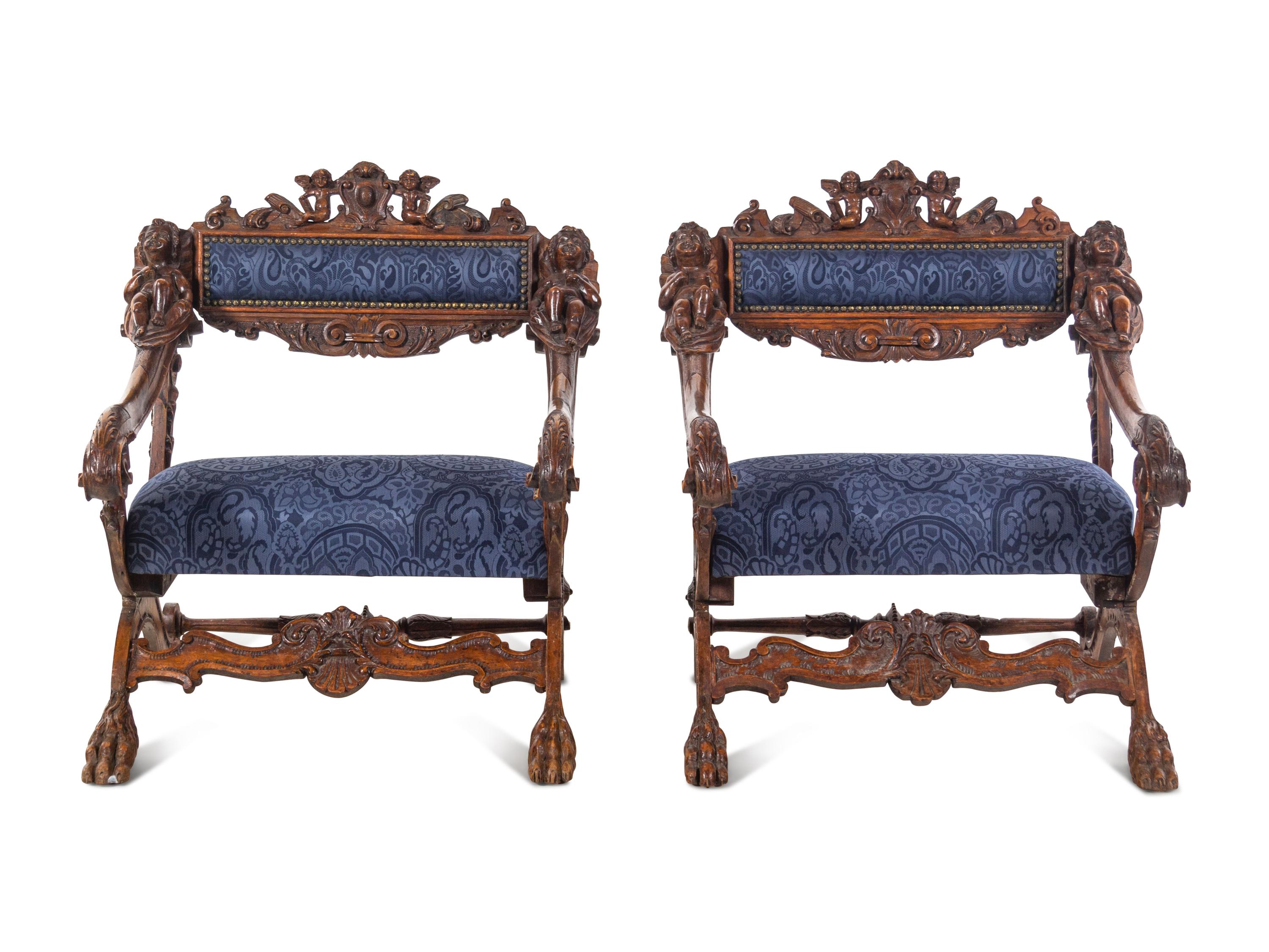 A Pair of Italian Renaissance Style Carved Walnut Armchairs