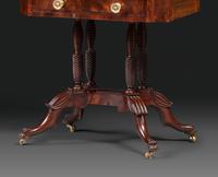 A Classical Figured Mahogany Two Drawer Claw-Foot Work Table