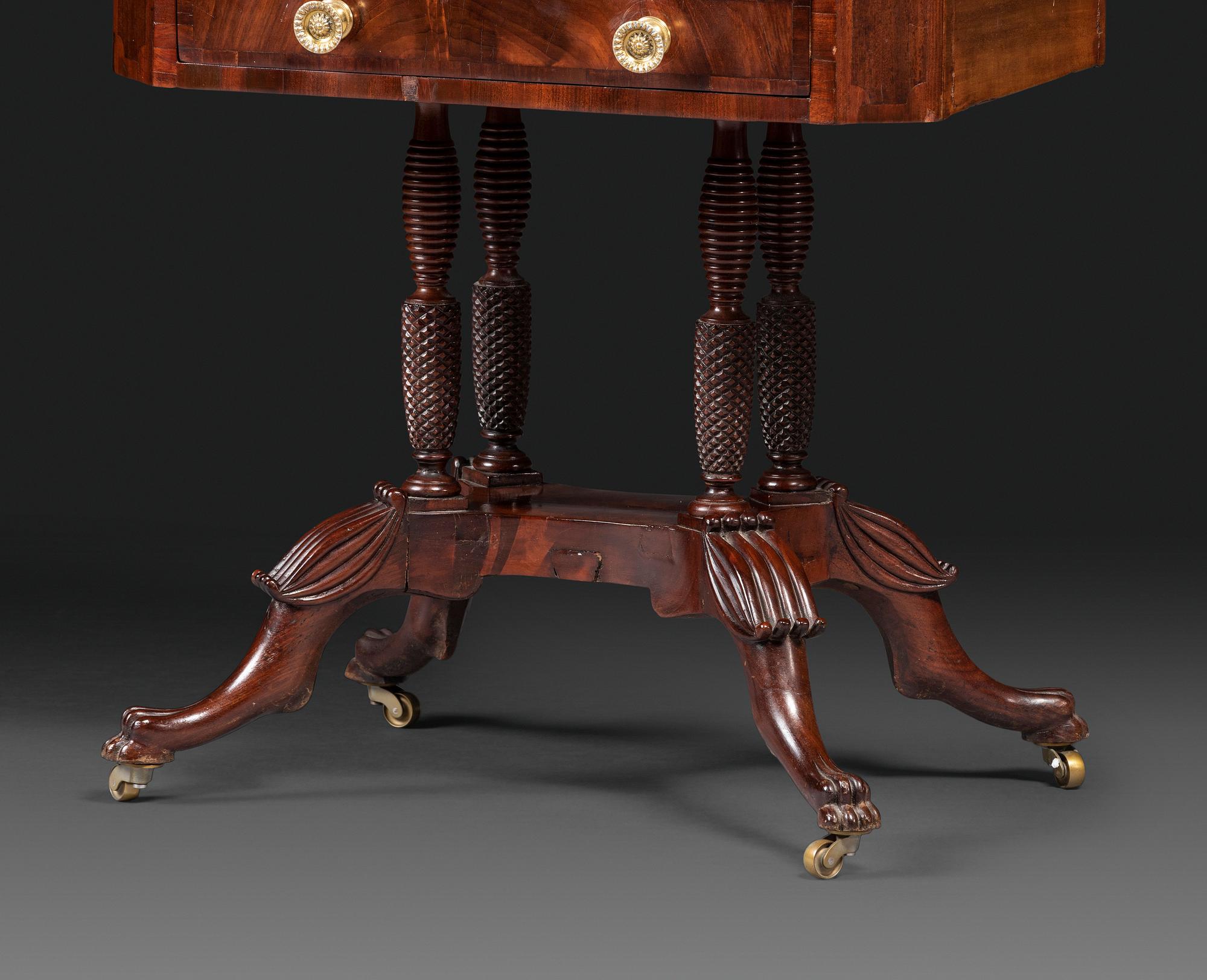A Classical Figured Mahogany Two Drawer Claw-Foot Work Table