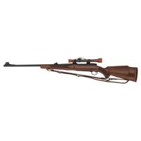 ** Winchester Model 70 with Lyman Alaskan Scope