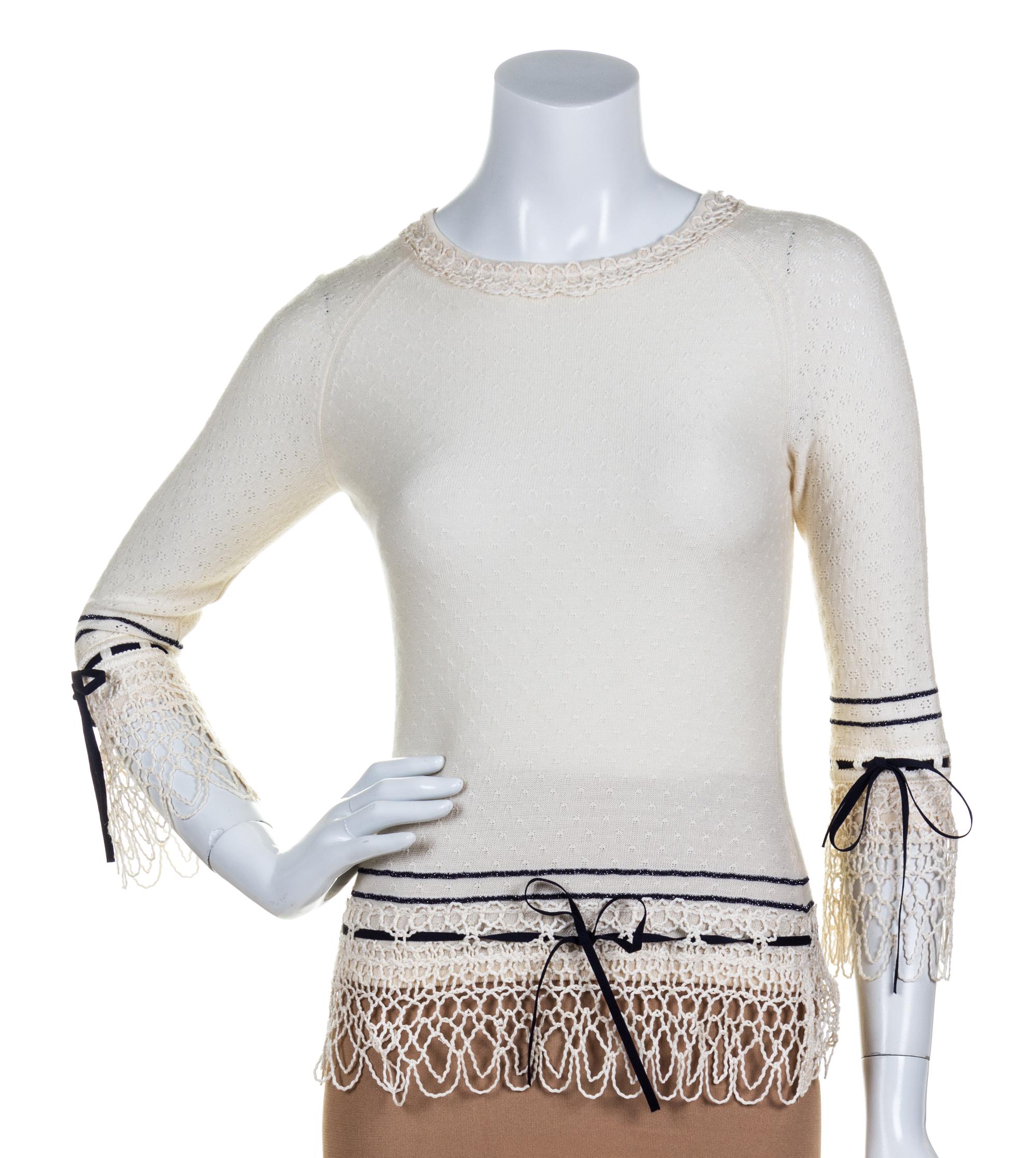 A Carolina Herrera Cream Sweater, Size S.