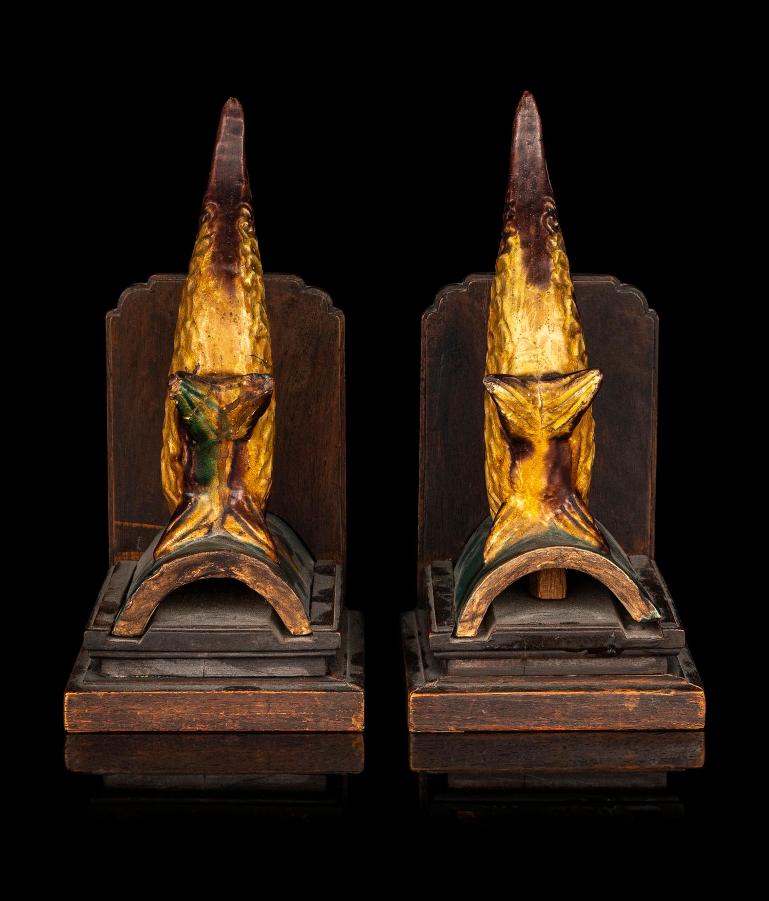 A Pair of Chinese Green and Yellow Glazed Stoneware Fish-Form Roof Tiles