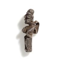 A Phoenician Silver Pendant of a Deity
