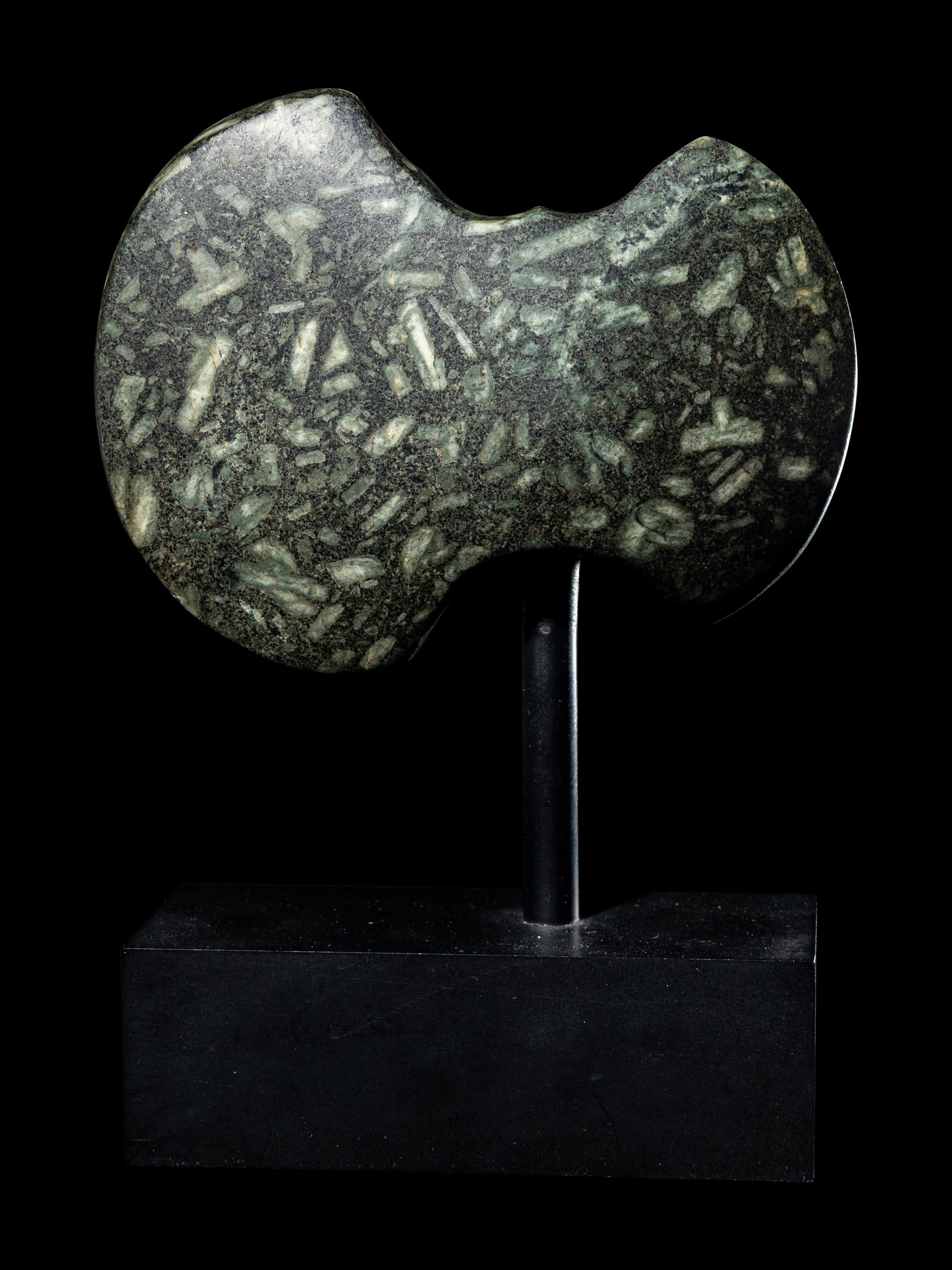 A Near Eastern Porphyry Axe Head
