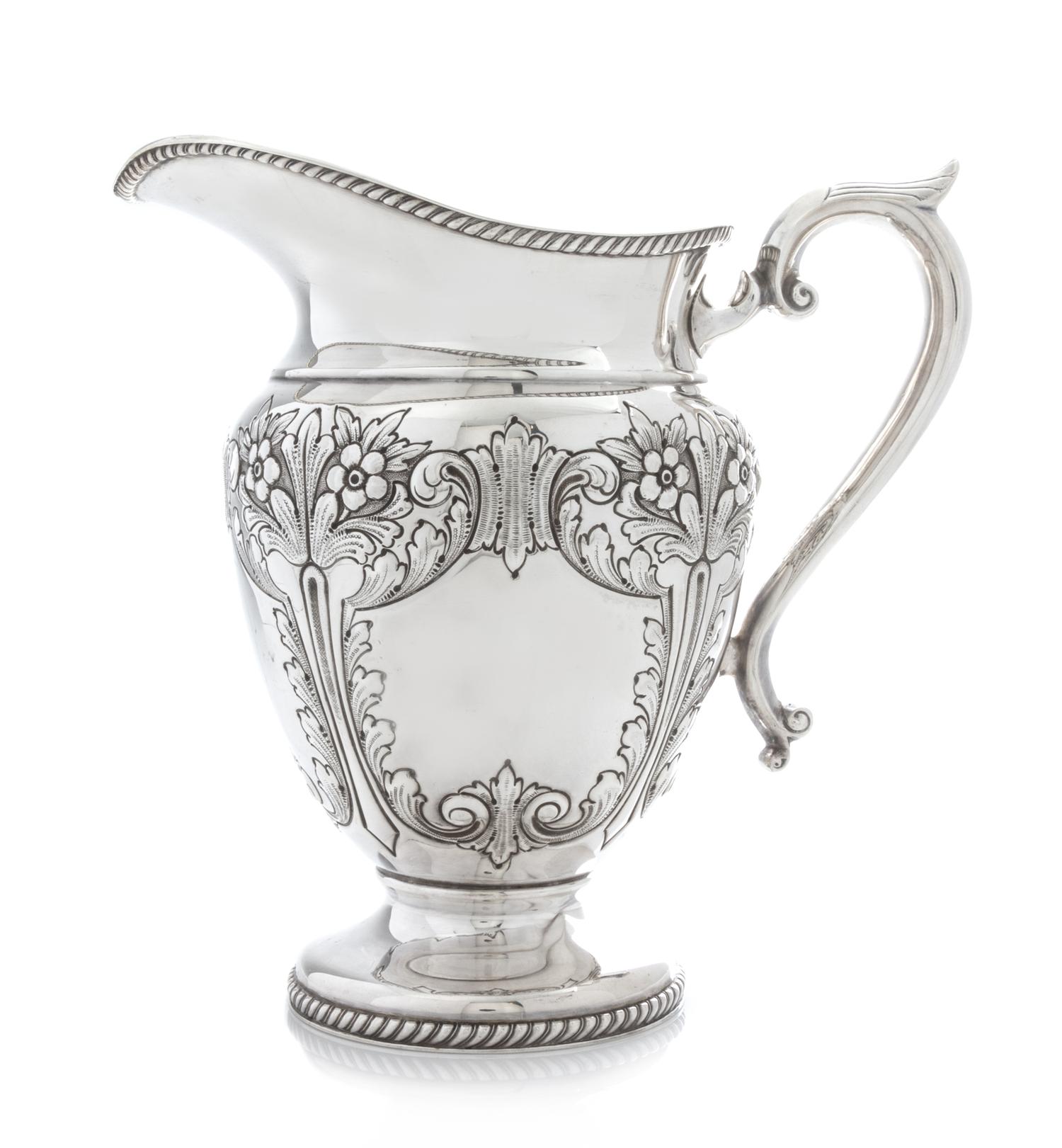 An American Silver Water Pitcher, Durham Silver Co., New York, NY, Mid-20th Century, of baluster form with a gadroon neck and foot rim,