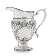 An American Silver Water Pitcher, Durham Silver Co., New York, NY, Mid-20th Century, of baluster form with a gadroon neck and foot rim,