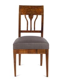An Austrian Neoclassical Burlwood Writing Table and Chair