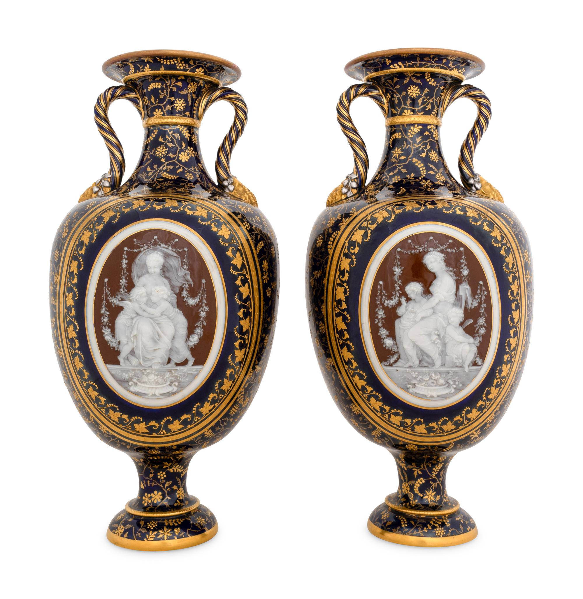 A Fine Pair of Mintons Pâte-sur-Pâte Cobalt Blue-Ground Vases