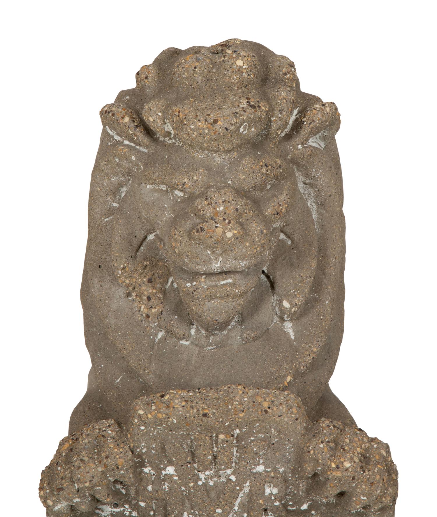 A Pair of Cast Cement Lions Holding Armorial Shields