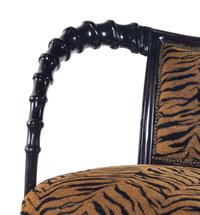 A Thomasville Hemingway Carved Wood Horn Armchair