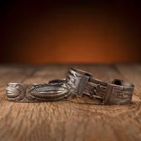 Pair of Navajo Silver Cuff Bracelets, with Thunderbirds