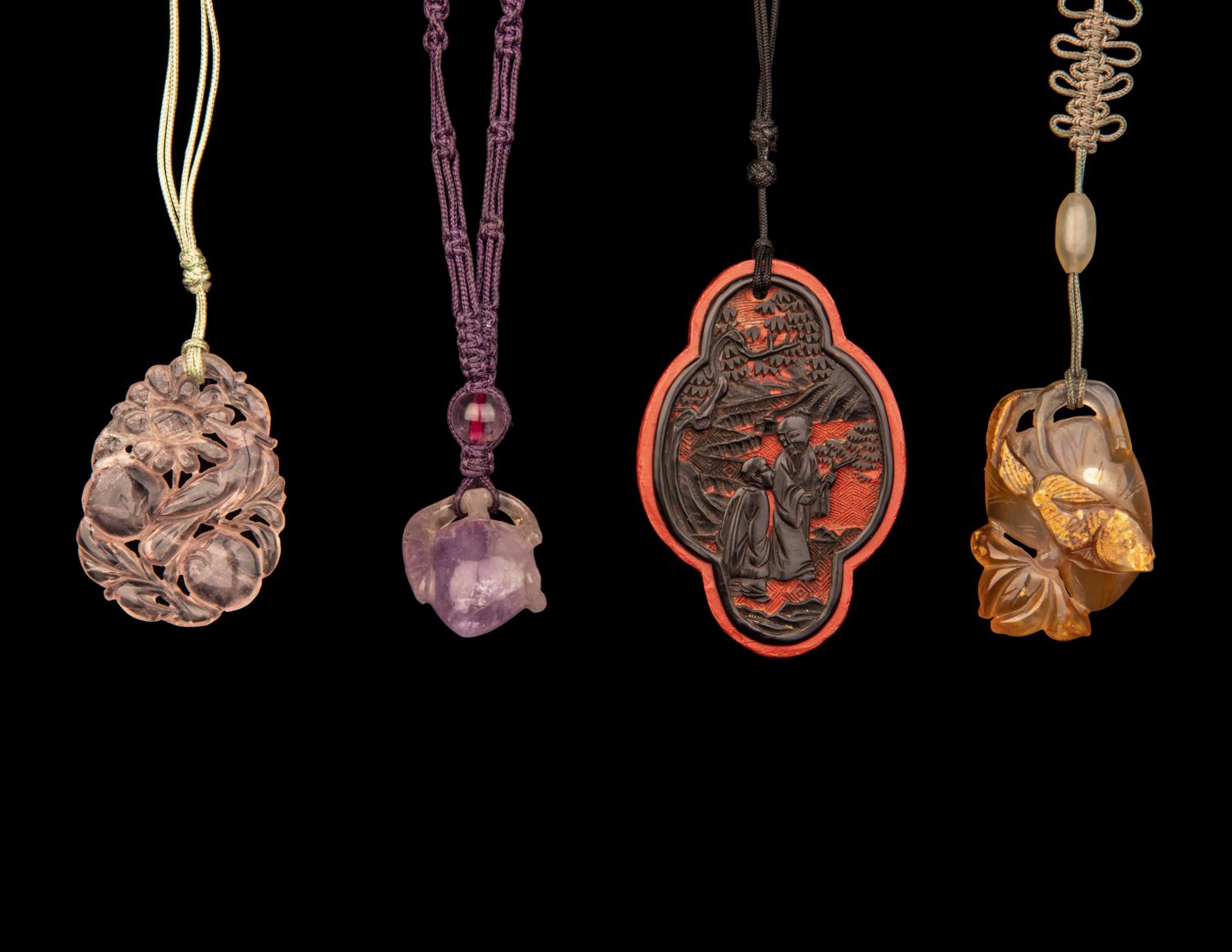 Eight Chinese Hardstone and Lacquer Pendants