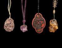 Eight Chinese Hardstone and Lacquer Pendants