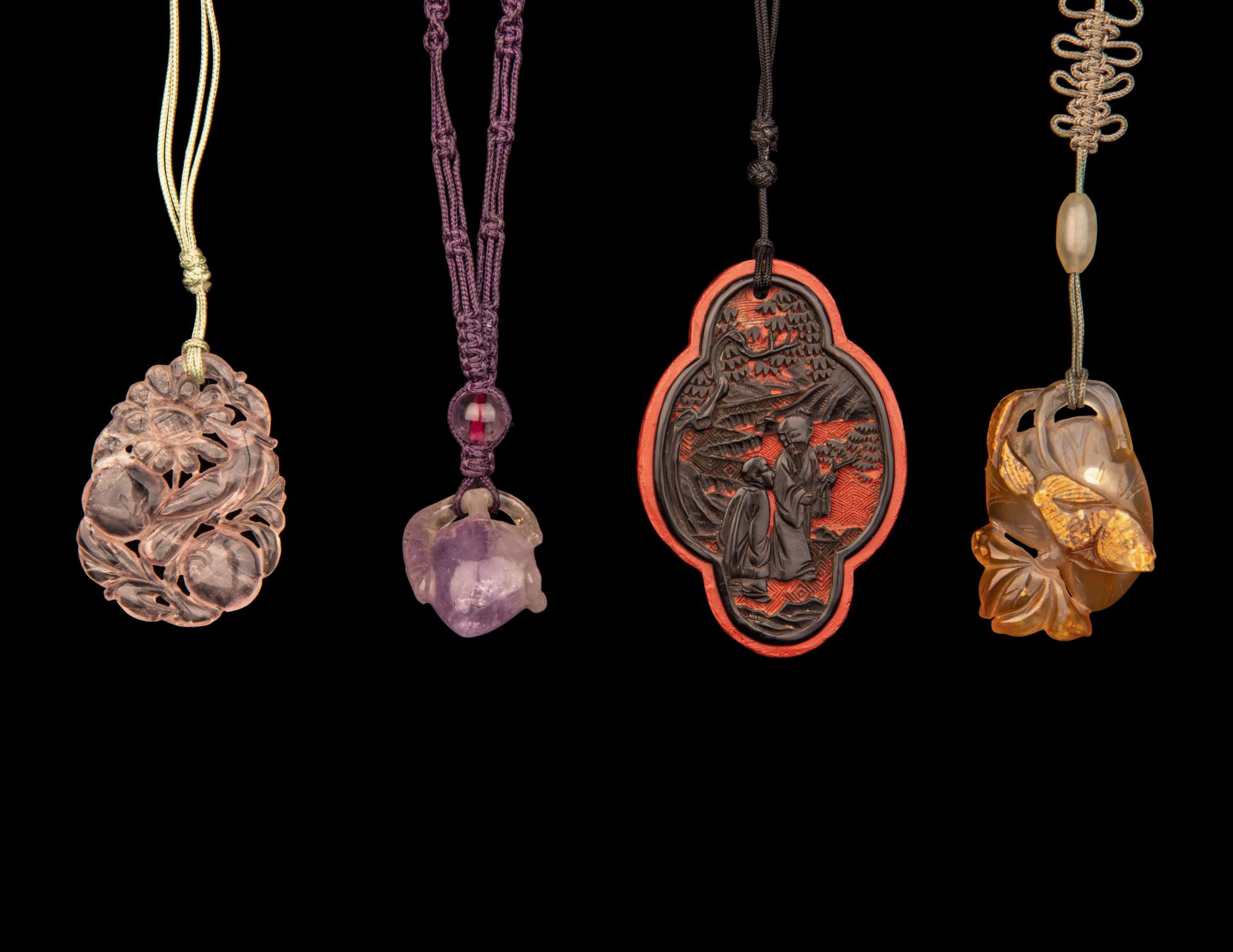Eight Chinese Hardstone and Lacquer Pendants