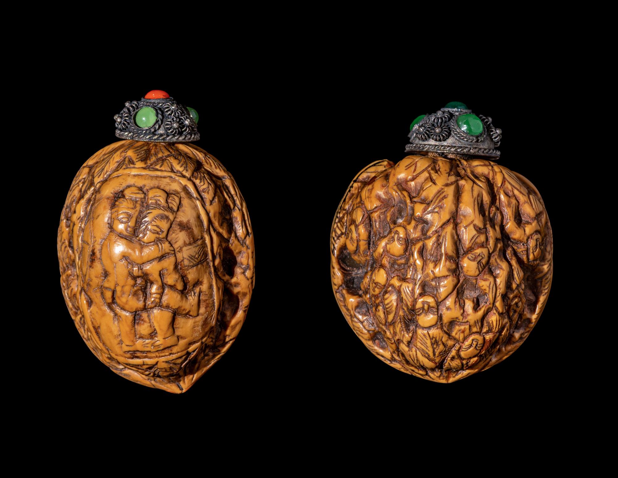 A Pair of Chinese Carved Walnut Snuff Bottles