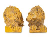 A Pair of Continental Bronze Recumbent Lions