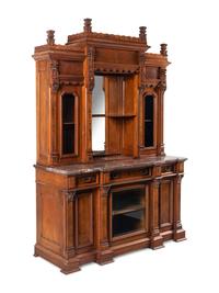A Victorian Walnut Marble-Top Cabinet