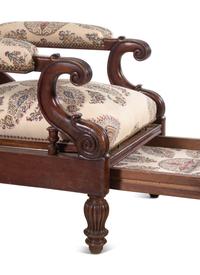 A Mahogany Reclining Armchair with Pull-Out Footrest