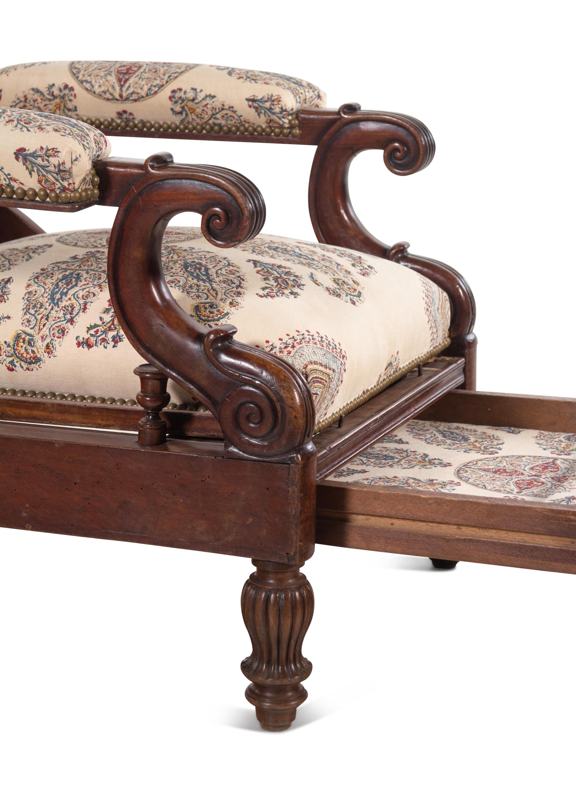 A Mahogany Reclining Armchair with Pull-Out Footrest