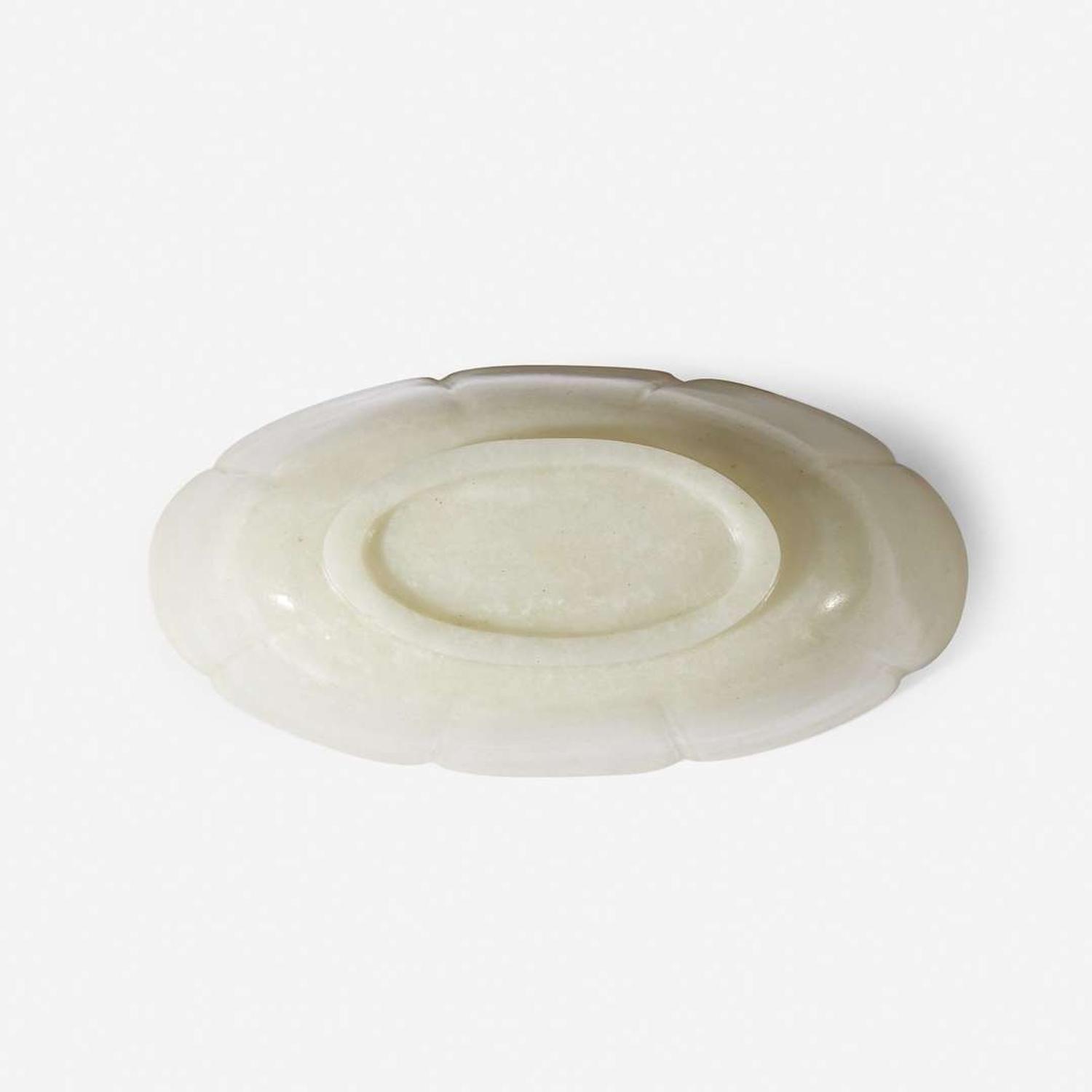 A Chinese pale greyish-white jade lobed oval bowl 灰白玉莲瓣碗