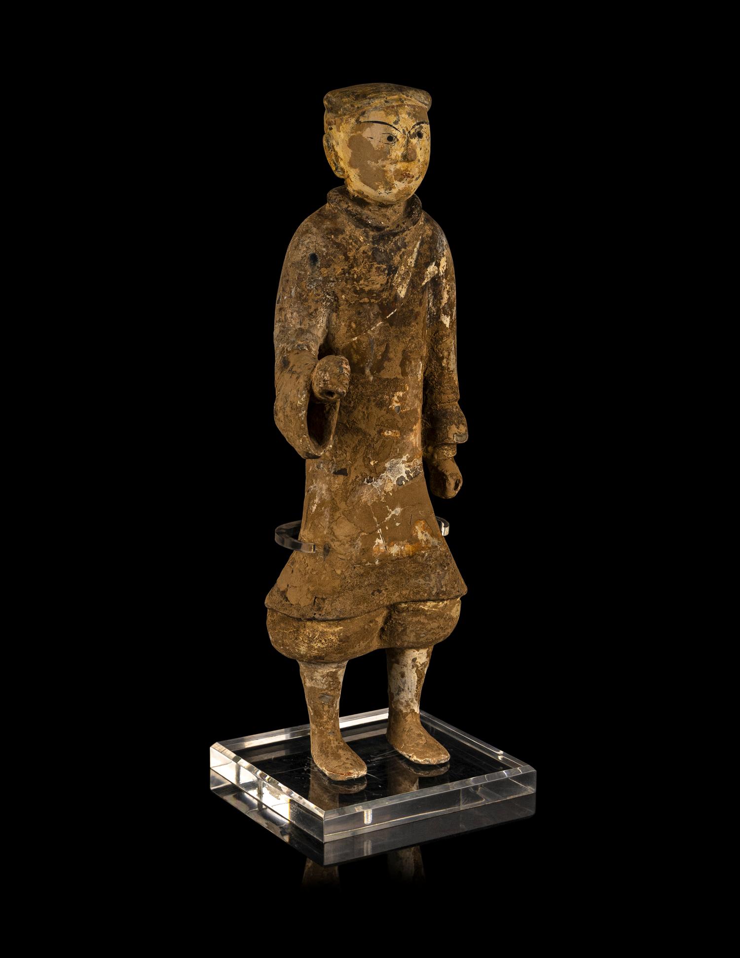 A Chinese Painted Grey Pottery Figure of a Figure
