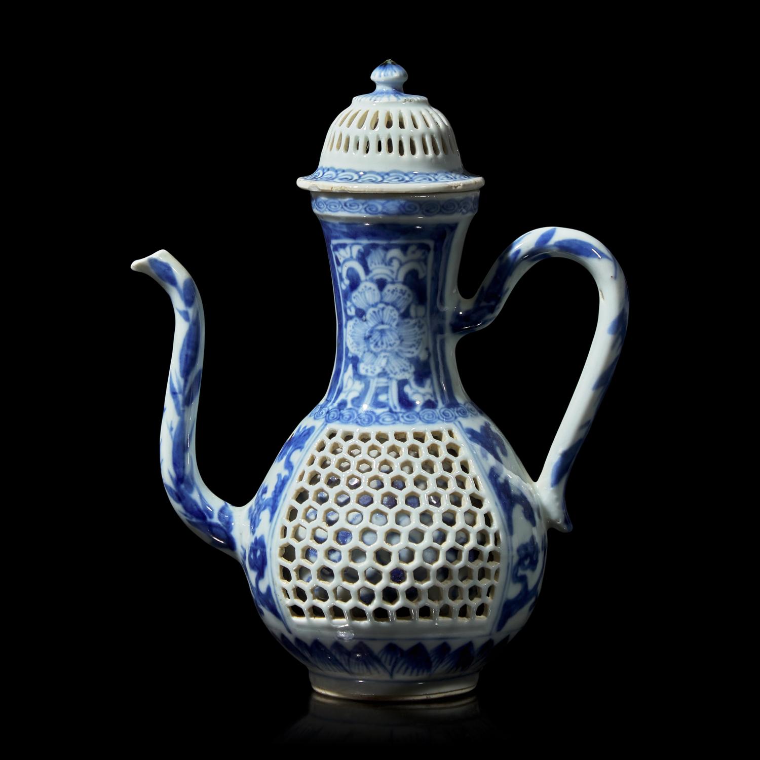 A Chinese Blue and White Double-Walled Reticulated Small Ewer and Cover, Kangxi Period 清康熙 青花鏤空花卉紋執壺
