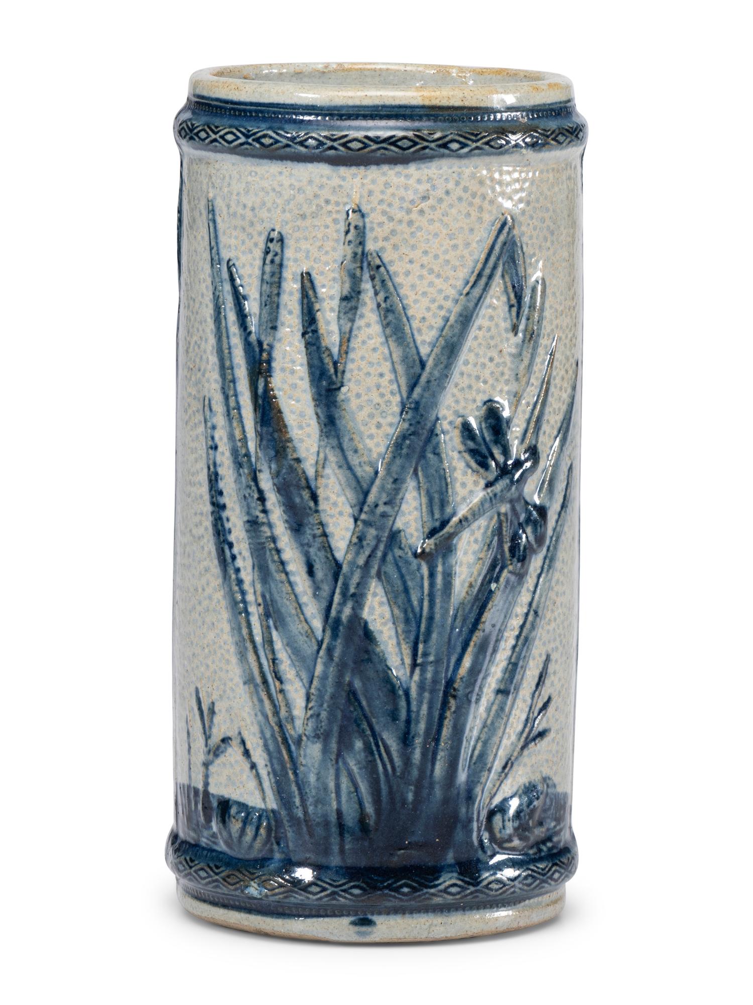 An 'Old Sleepy Eye' Molded Stoneware Vase