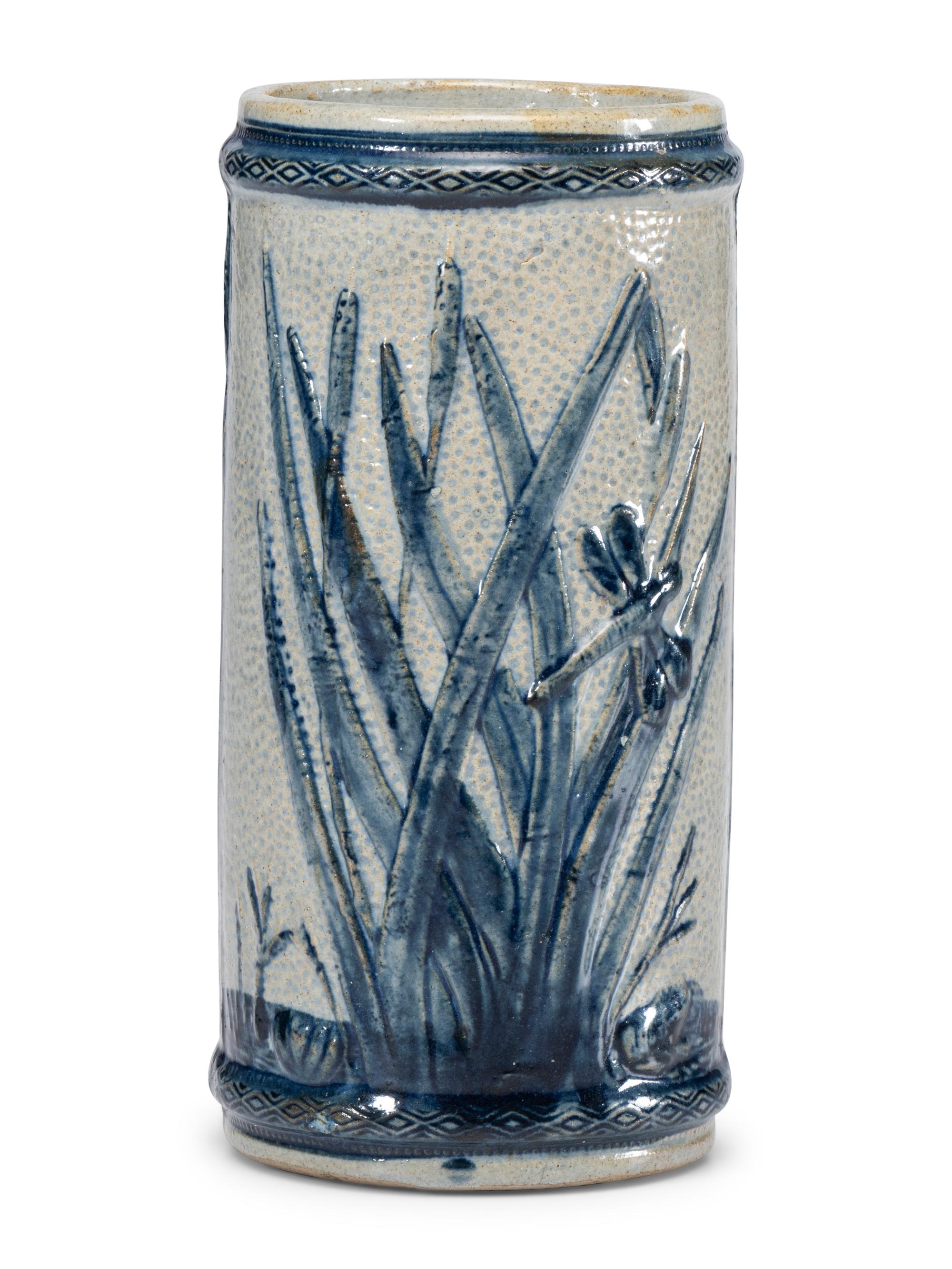 An 'Old Sleepy Eye' Molded Stoneware Vase