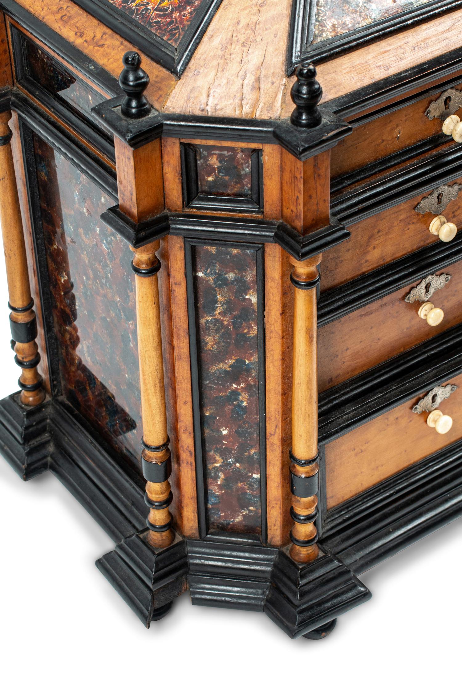 A Continental Birdseye Maple, Ebonized Wood and Painted Foil Table Cabinet