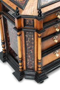 A Continental Birdseye Maple, Ebonized Wood and Painted Foil Table Cabinet