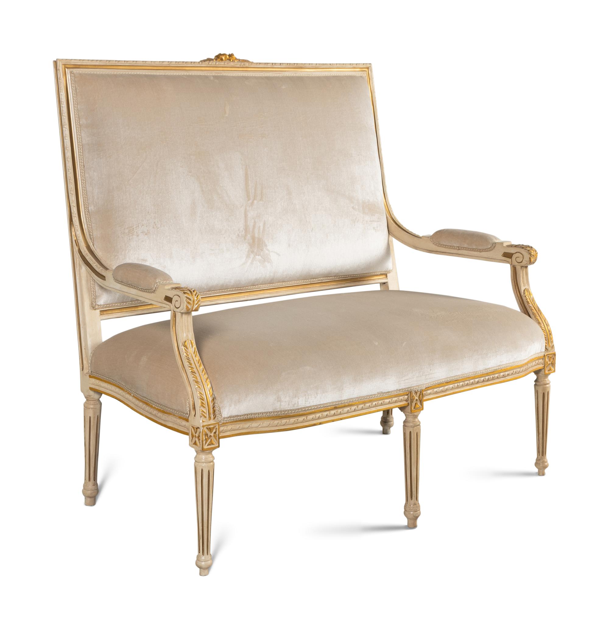 A Louis XVI Style Painted and Parcel Gilt Settee