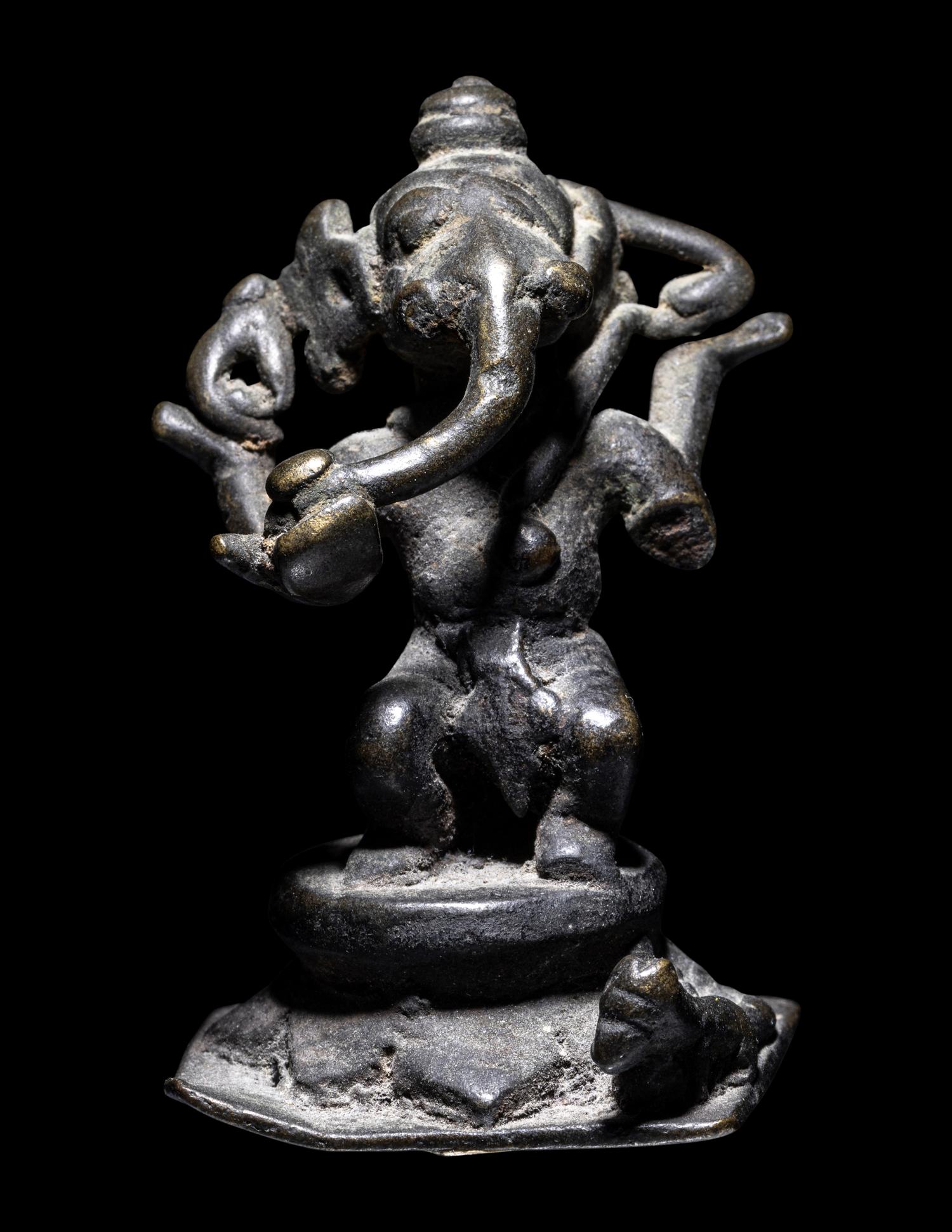 A Small Indian Bronze Figure of Ganesha
