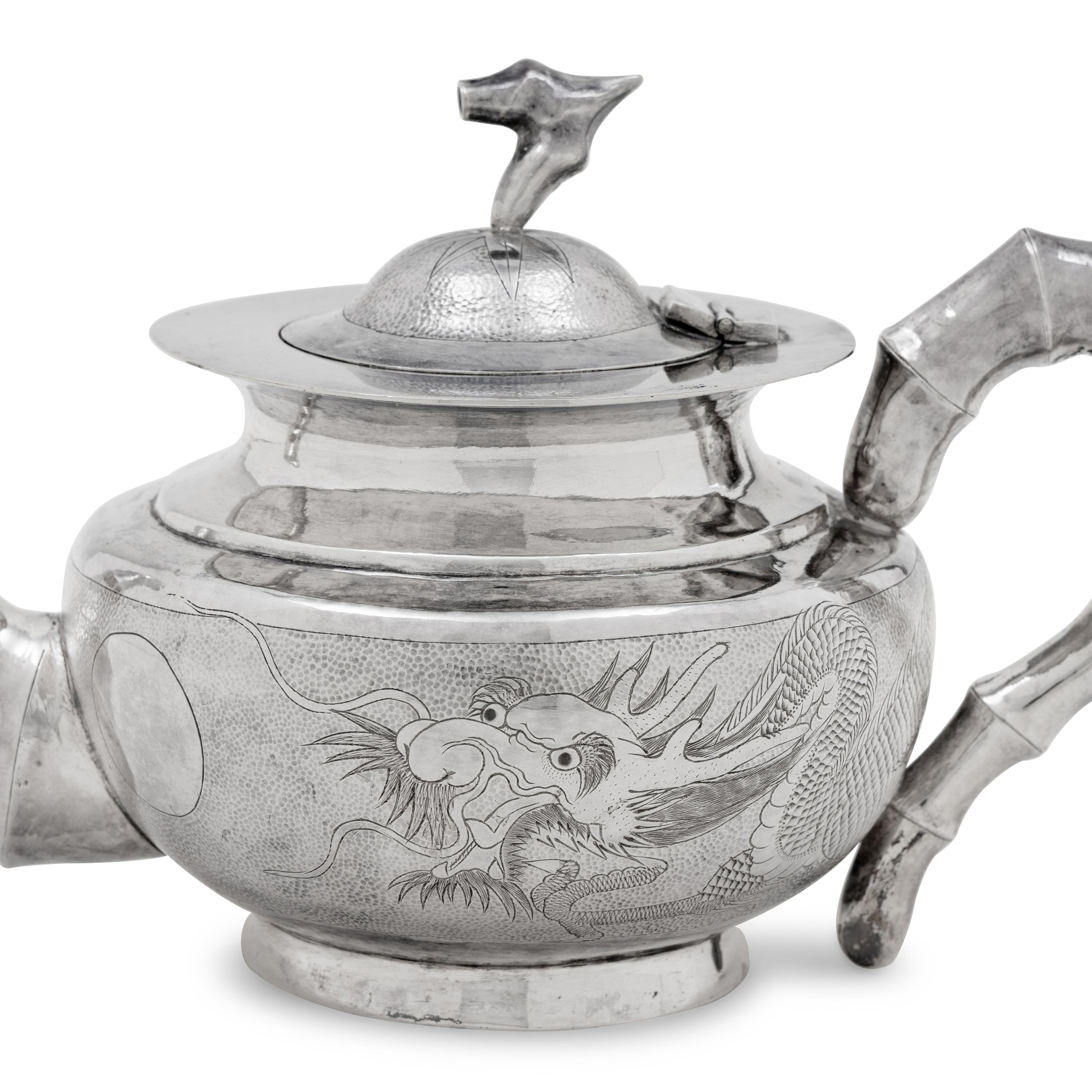 A Chinese Silver Three-Piece Tea Service