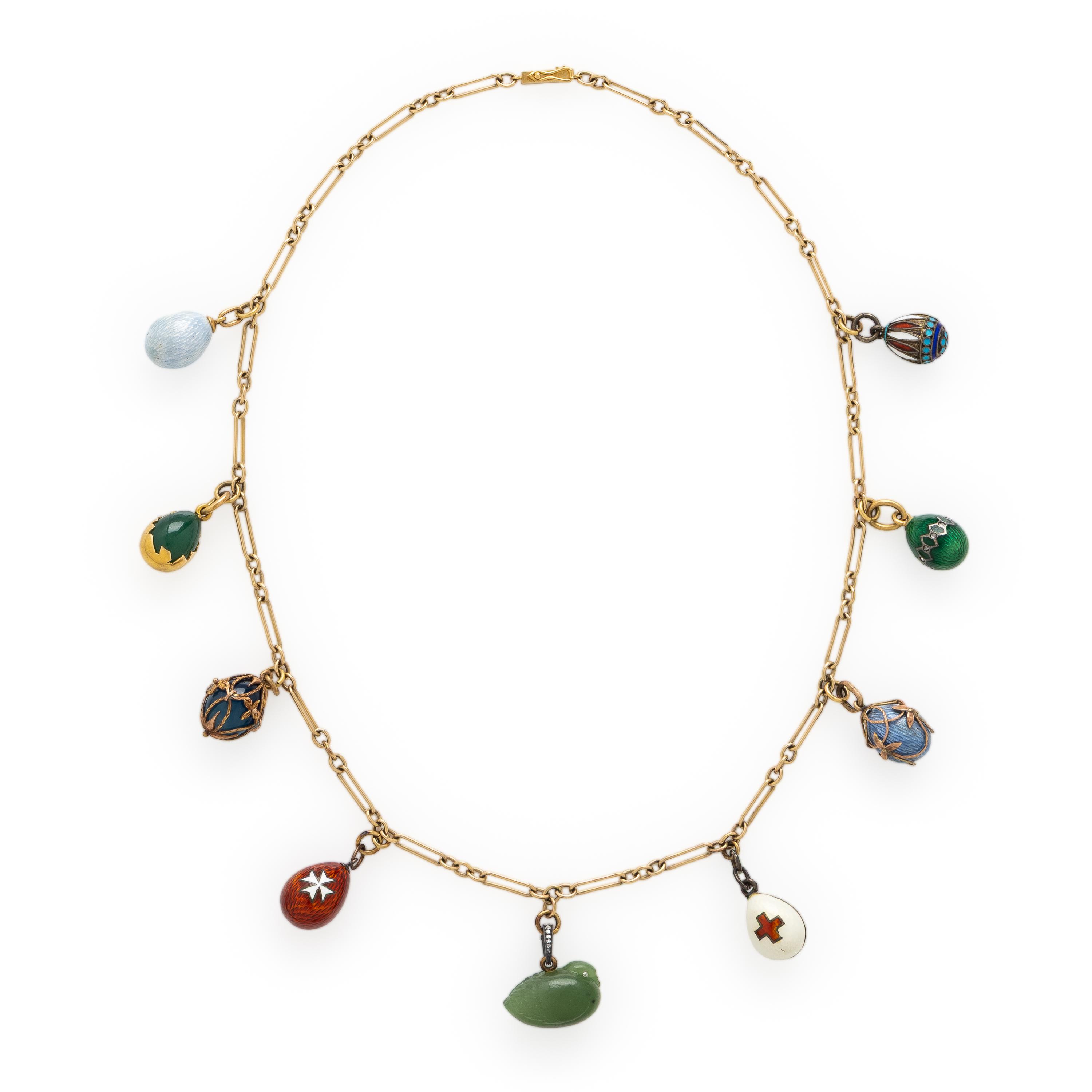 Russian, Attributed to Fabergé, Collection of Yellow Gold, Hardstone, and Enamel Charms
