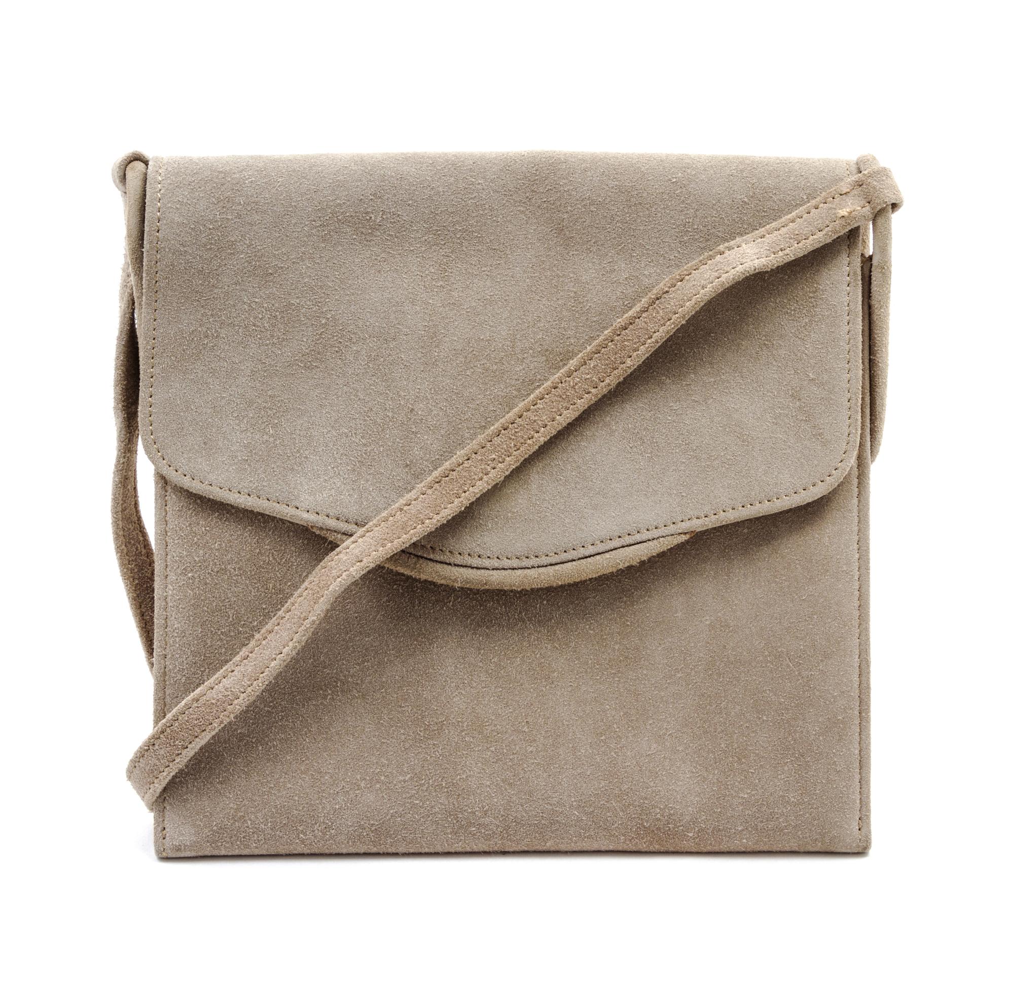 An Hermes Taupe Suede Shoulder Bag, 7 1/2 x 7 1/2 x 1 inches.