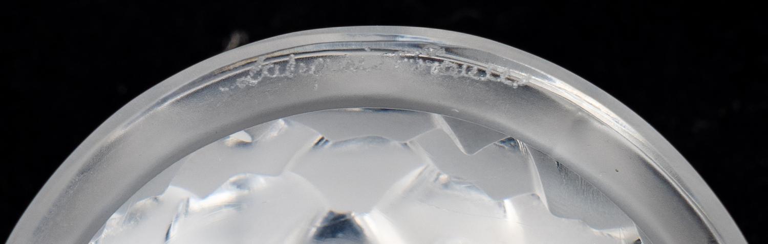 Two Lalique Glass Paperweights: Tete d'Aigle — 20TH/21ST CENTURY