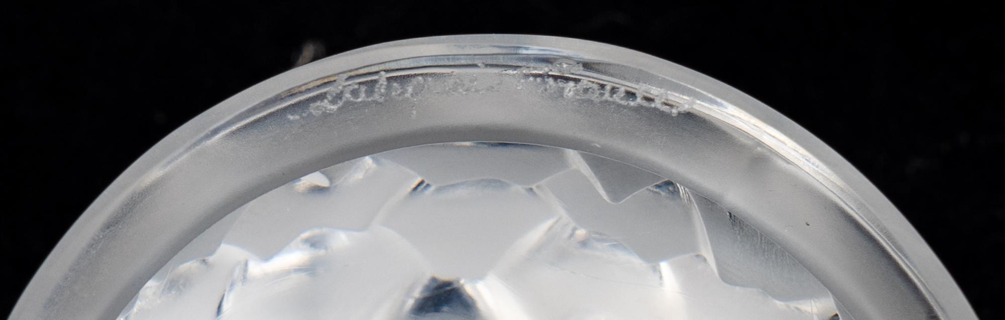 Two Lalique Glass Paperweights: Tete d'Aigle — 20TH/21ST CENTURY