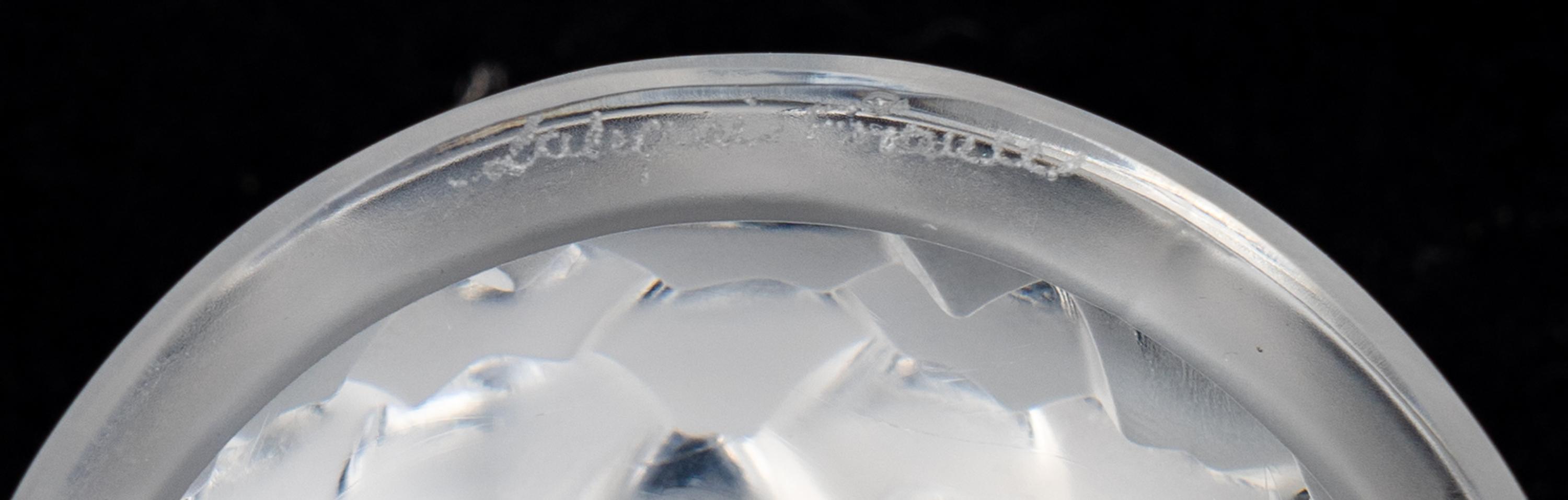 Two Lalique Glass Paperweights: Tete d'Aigle — 20TH/21ST CENTURY