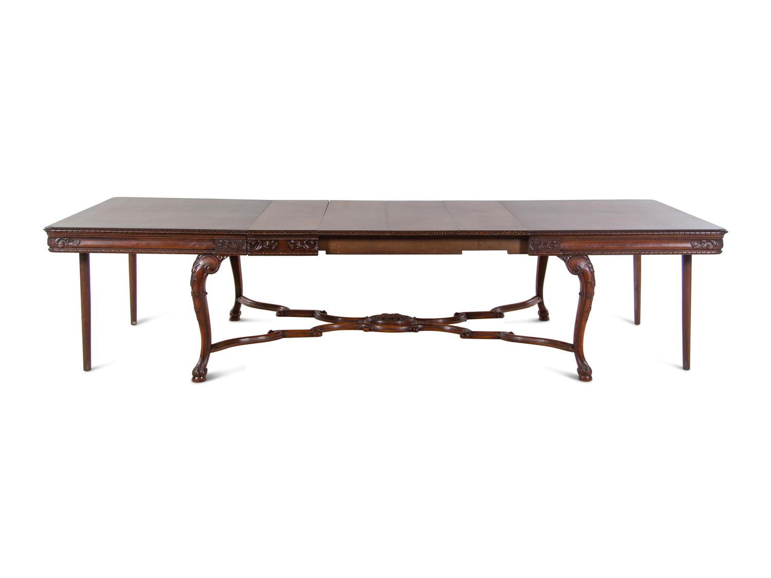 A George II Style Walnut Dining Table