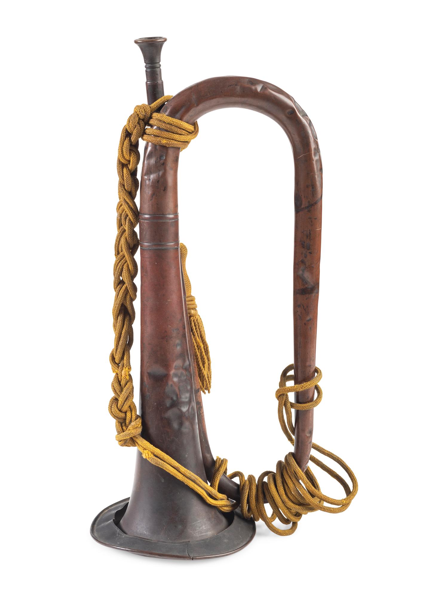 Civil War US Regulation bugle with original cavalry cords. Manufactured by Horstmann, Philadelphia, PA.