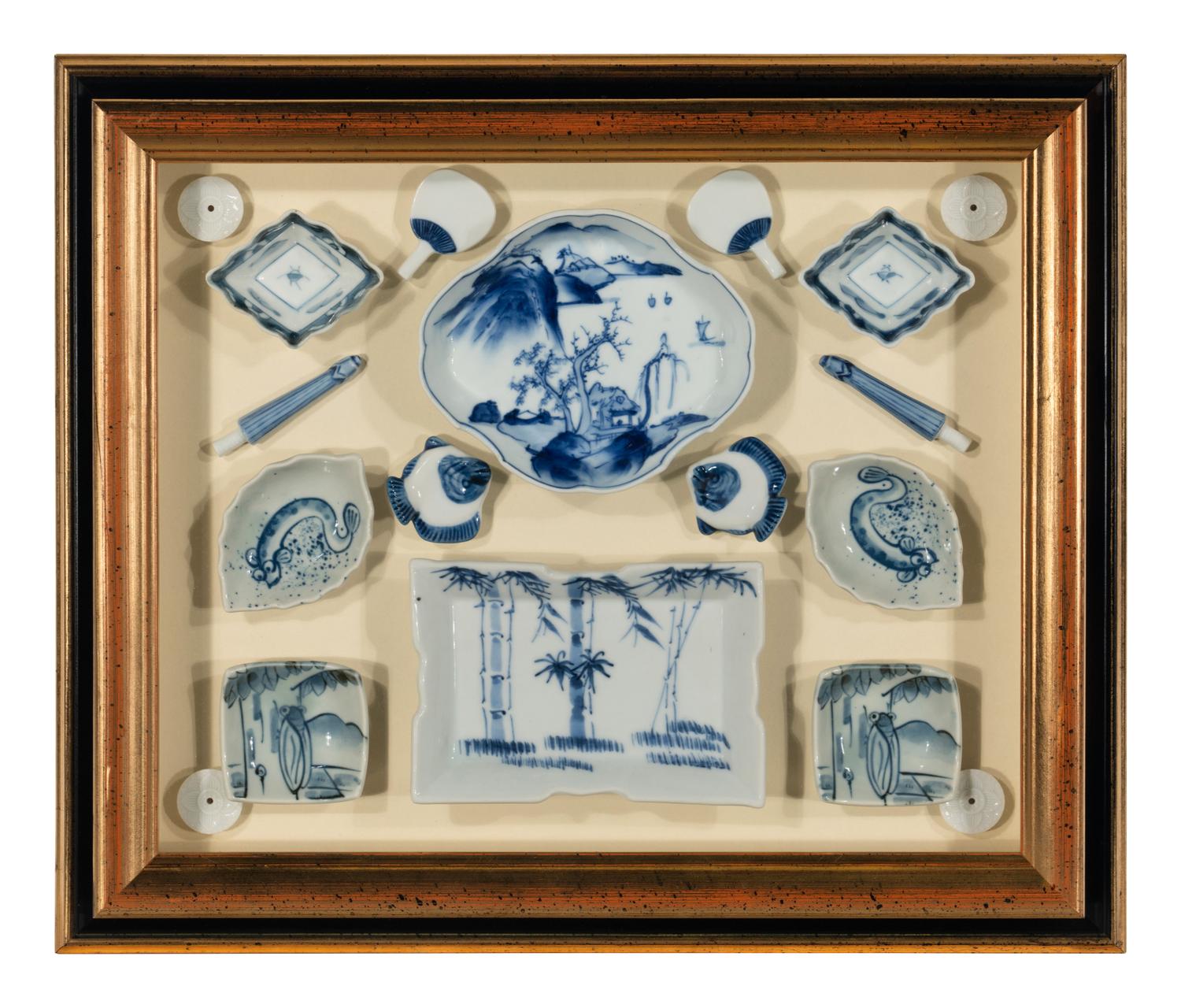 Four Shadow Boxes Mounted with Chinese Blue-and-White Porcelain Articles